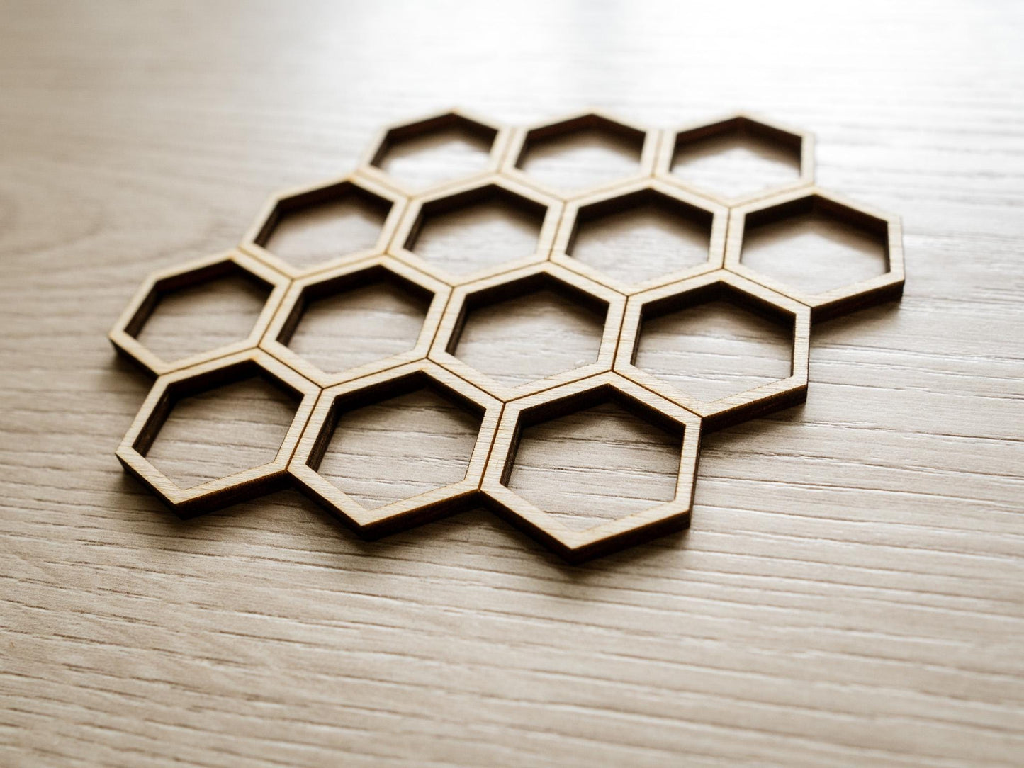 Hexagonal cookie cutter set on a light background