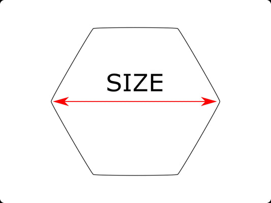 Hexagonal marble tiles on a beige background with green leaves.