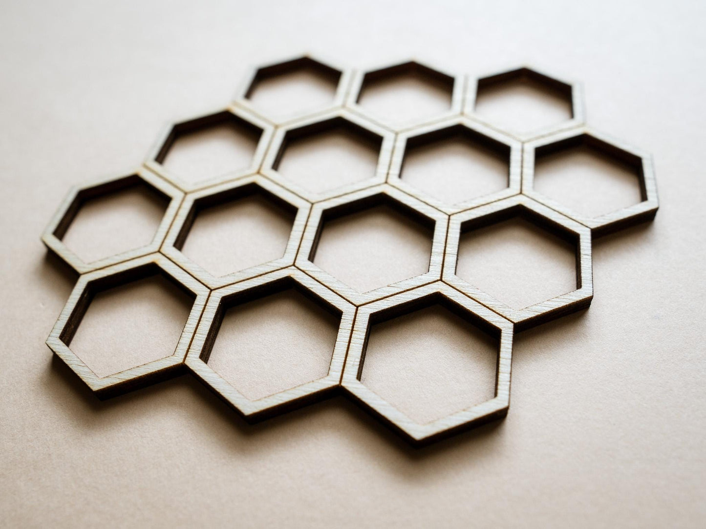 Hexagonal cookie cutter set on a light background