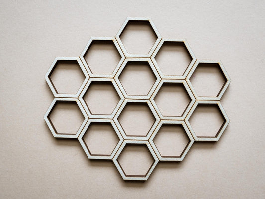 Hexagonal cookie cutter set on a light background